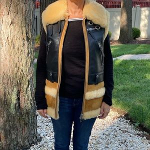 Coach leather/shearling vest.